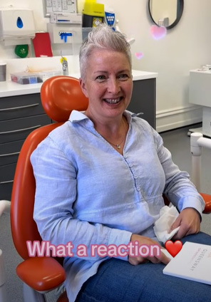 Lisa's reaction to her new smile!